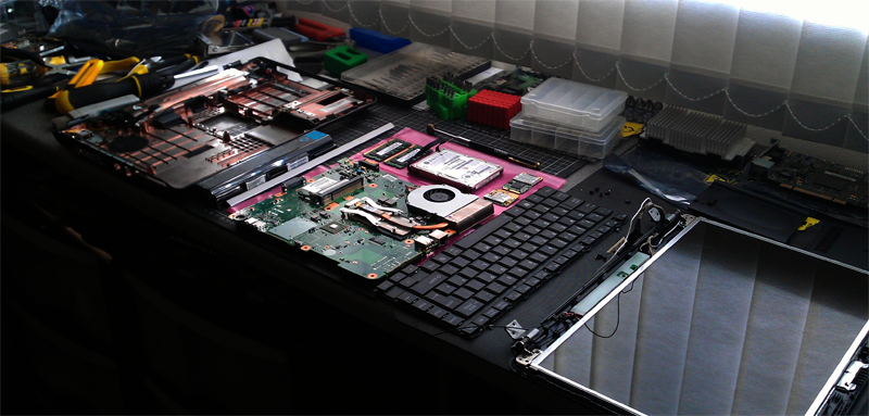 image of a macbook taken apart for repair by a apple mac computer repair shop in stevenage providing macbook screen repair in stevenage hitchin letchworth knebworth baldock welwyn garden city digswell hertford watton at stone hatfield preston harpenden shefford biggleswade royston north herts hertfordshire south beds bedfordshire