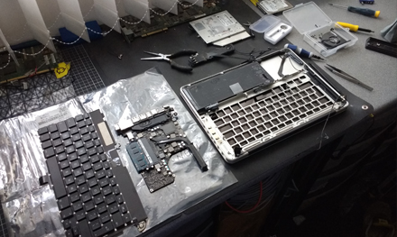 this is an image of a apple macbook pro keyboard replacement of a failed macbook pro keyboard that had been damaged from a drink spill and had stopped working